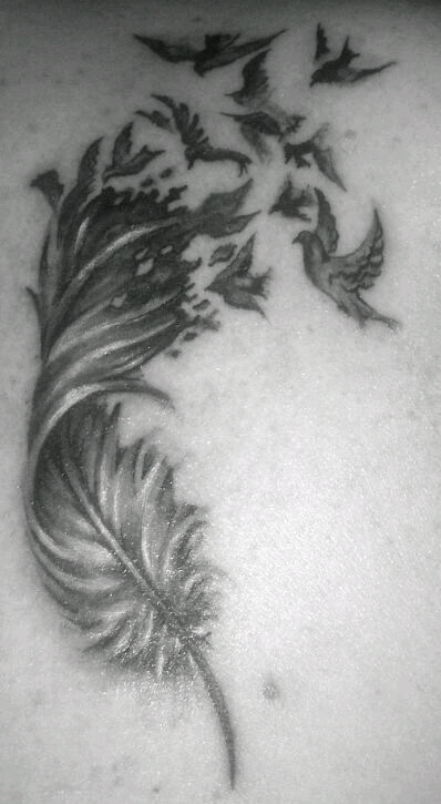 Trisha's beautiful variation of the Bird's of a Feather Tattoo by Pierce